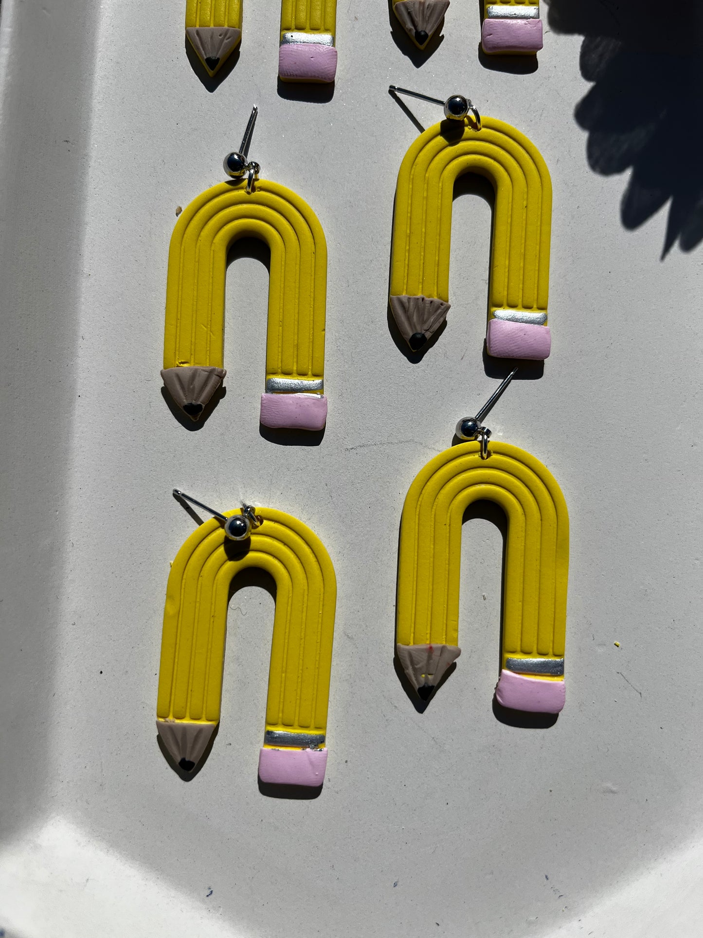 Pencil Arch Dangles