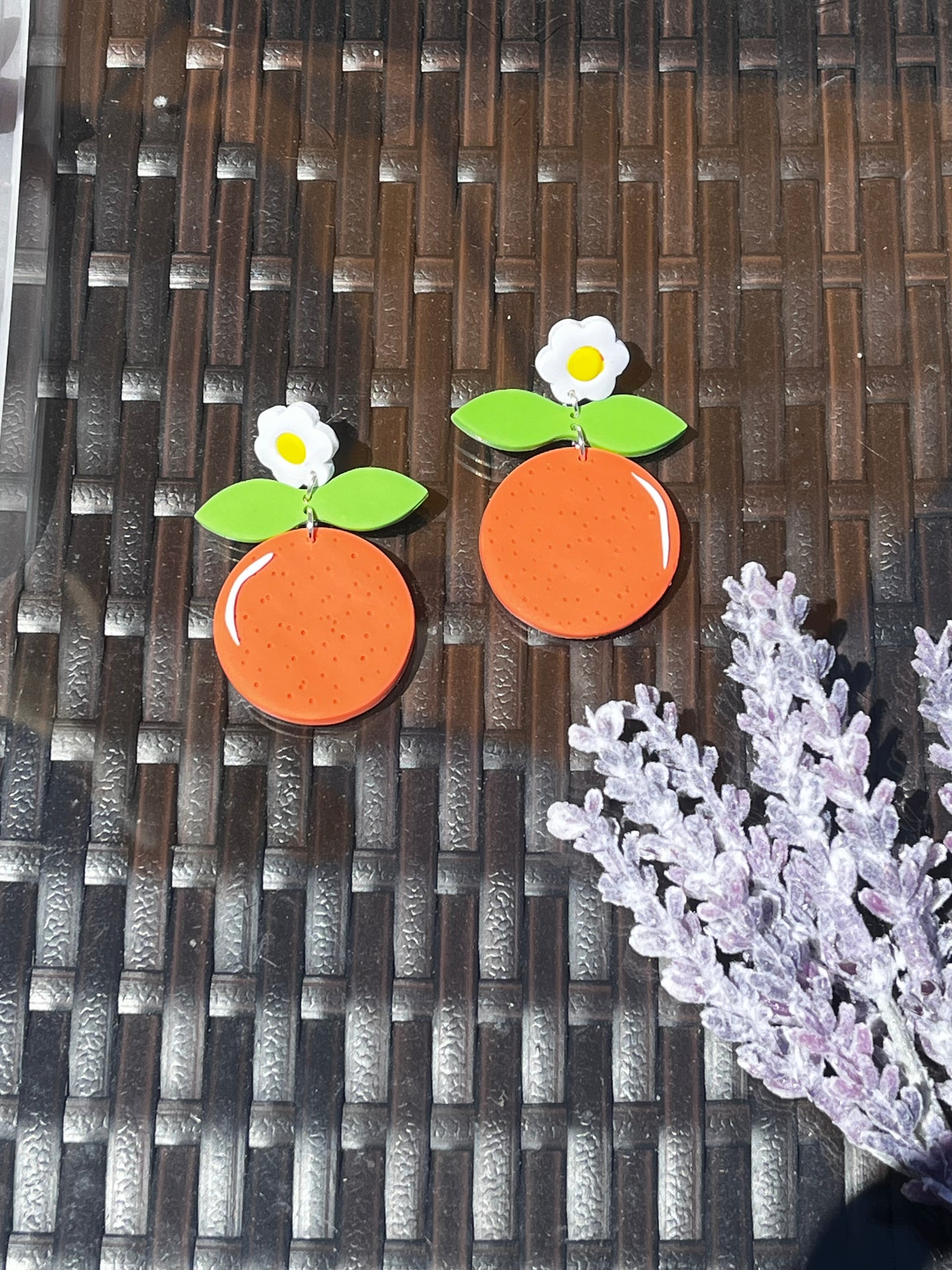 Orange Dangles with White Flower